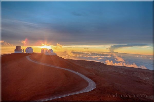 Observatories at sunset on Maunakea, one of the tallest volcanoes in the world